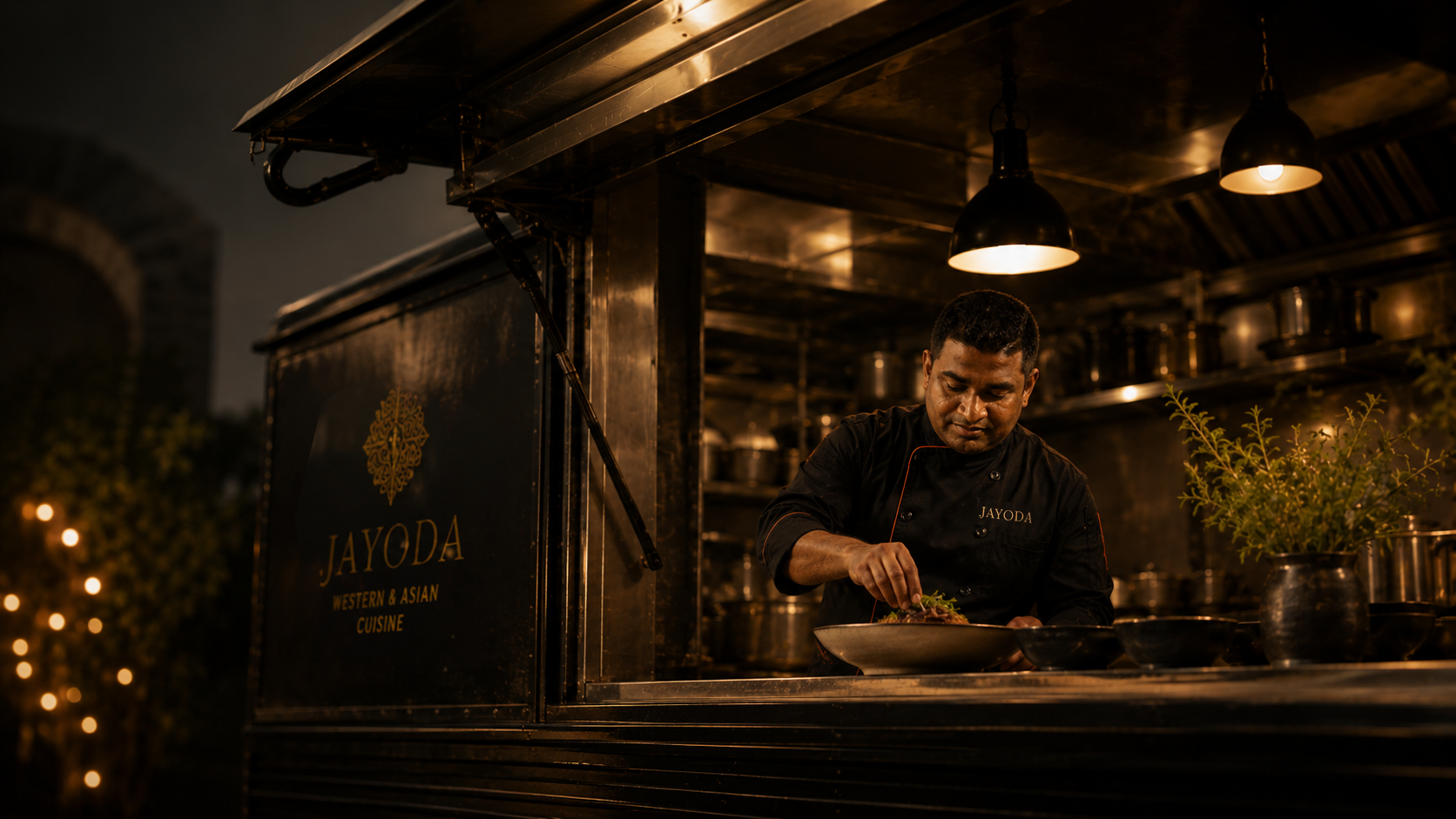 Head chef at the JAYODA service window